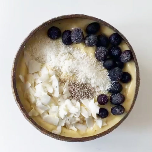 Macadamia & Coconut Nice Cream in a coconut bowl