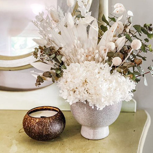 Soy candle with bunch of flowers