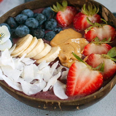 Coconut Acai bowl served in a coconut bowl