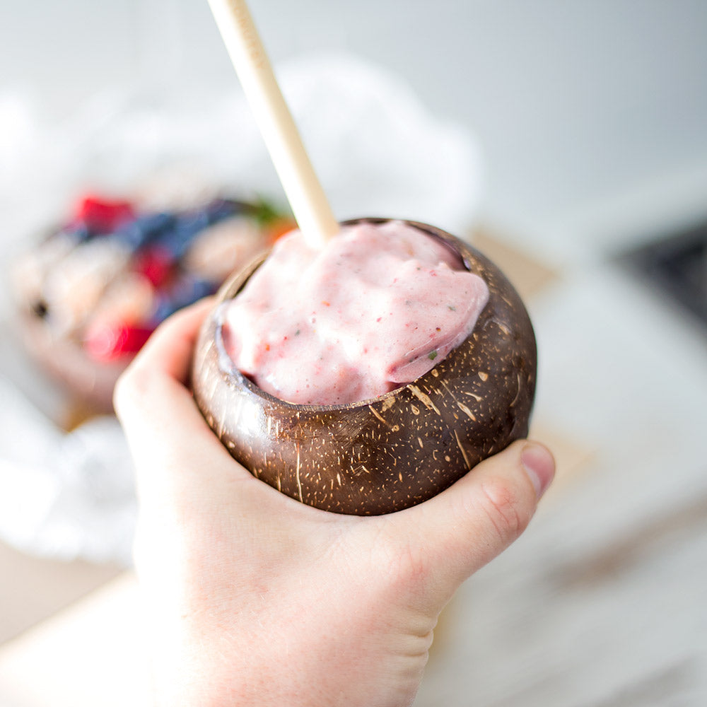 Coconut cup with strawberry smoothie