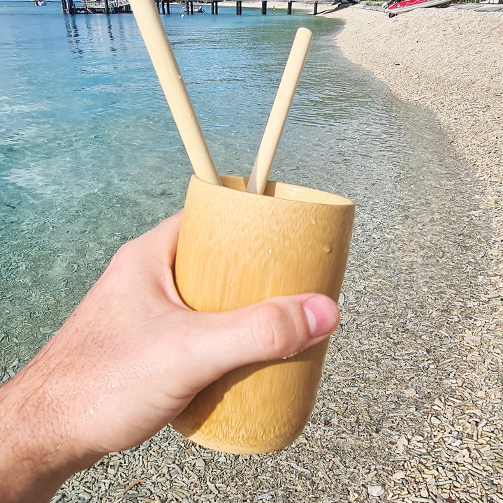 Bamboo cup smoothies on the beach